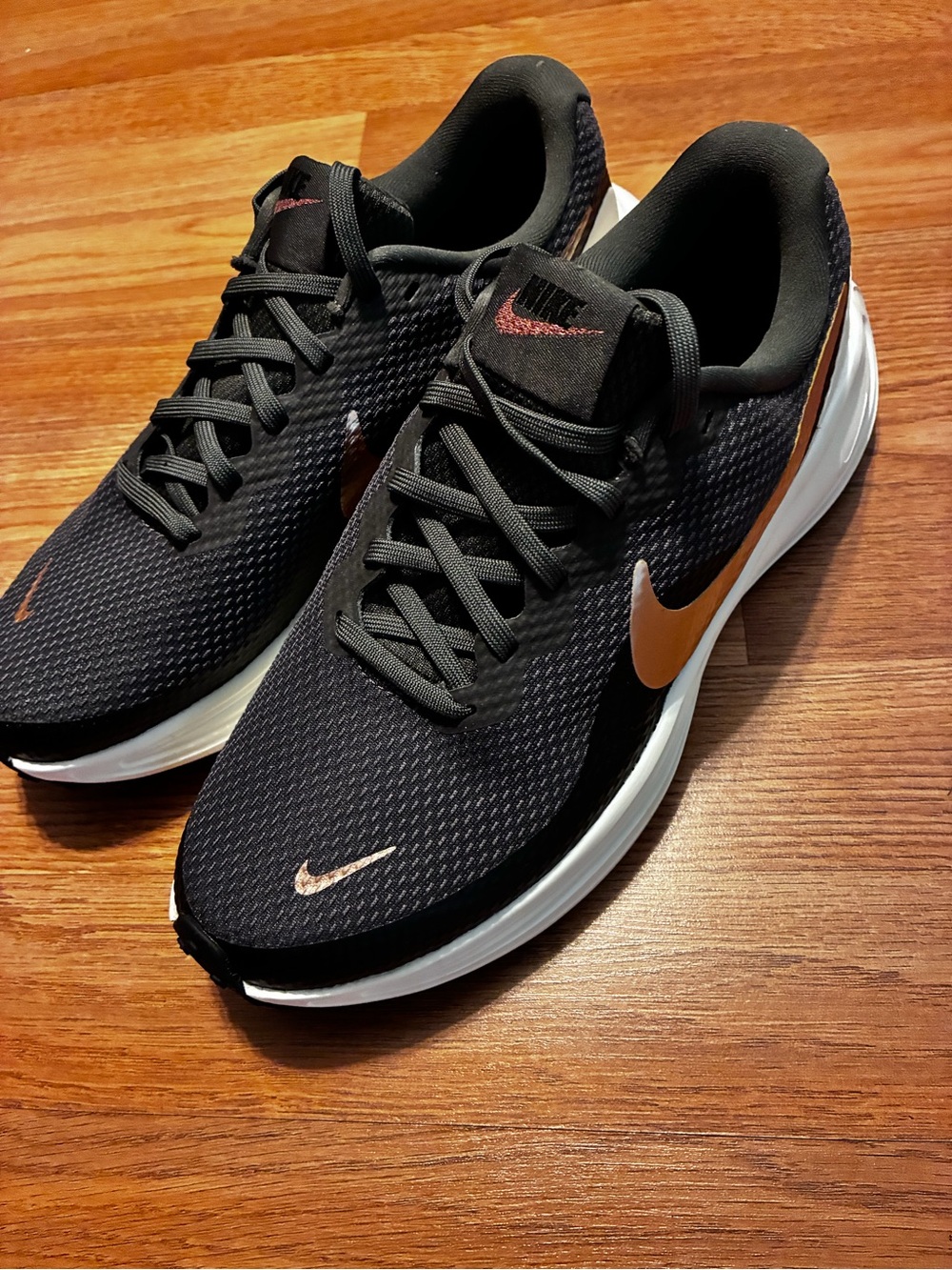 Nike Women Black and Copper Running Shoes